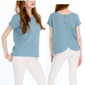 Adorable blue top with back buttons